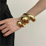 Geometric Spiral Water Droplet Opening Bracelet in Gold Tone