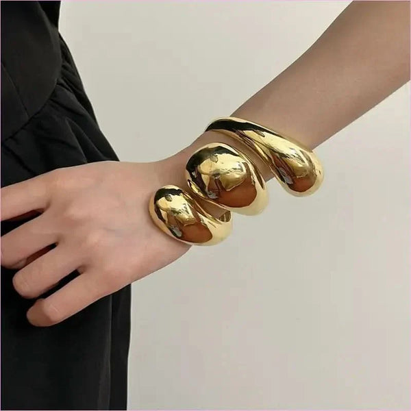 Geometric Spiral Water Droplet Opening Bracelet in Gold Tone