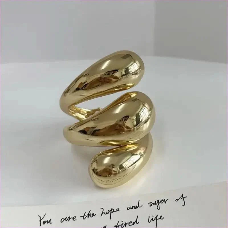 Geometric Spiral Water Droplet Opening Bracelet in Gold Tone